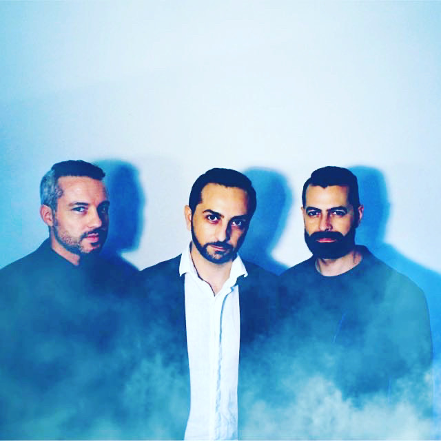 Posh in a blue studio portrait with a mist effect